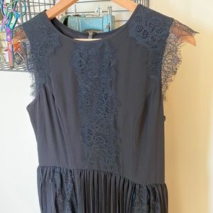 Pleated dress with lace detailing
